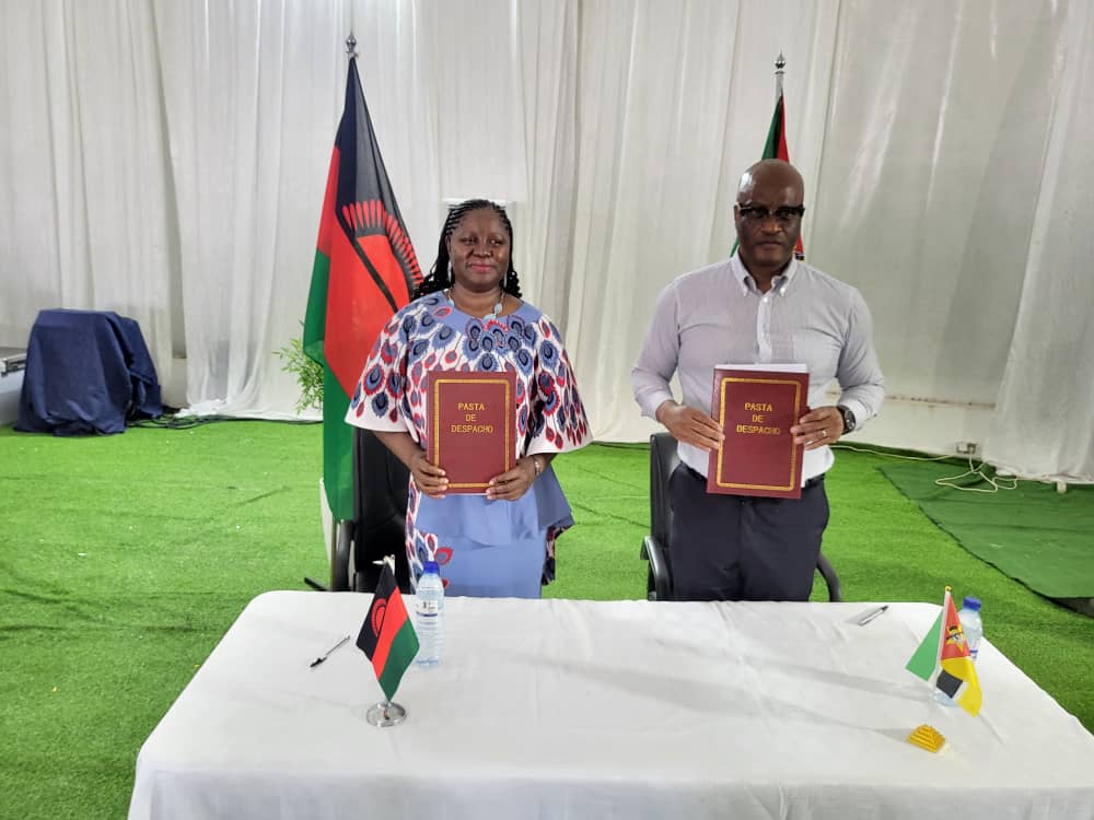 Co-Chairs display their committments after signing